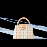  Signature carryall bag carried on shoulder