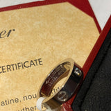 Close-up detail view of Cartier unisex jewelry piece