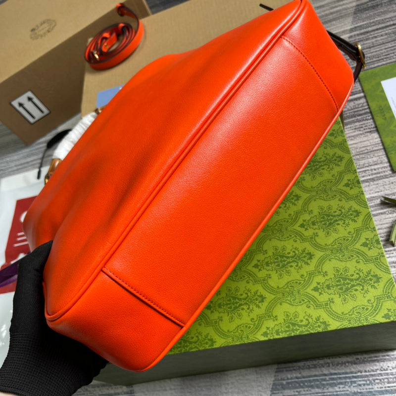 Styled lifestyle shot of polished refined women's handbag – women's luxury accessory