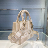 Close-up detail of signature chic women's handbag – women's designer-style accessory