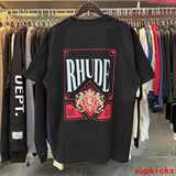 Flat lay presentation of Rhude luxury clothing with runway-inspired design