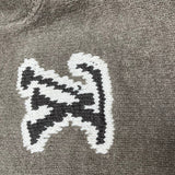 Front view of Louis Vuitton luxury clothing with label-forward styling