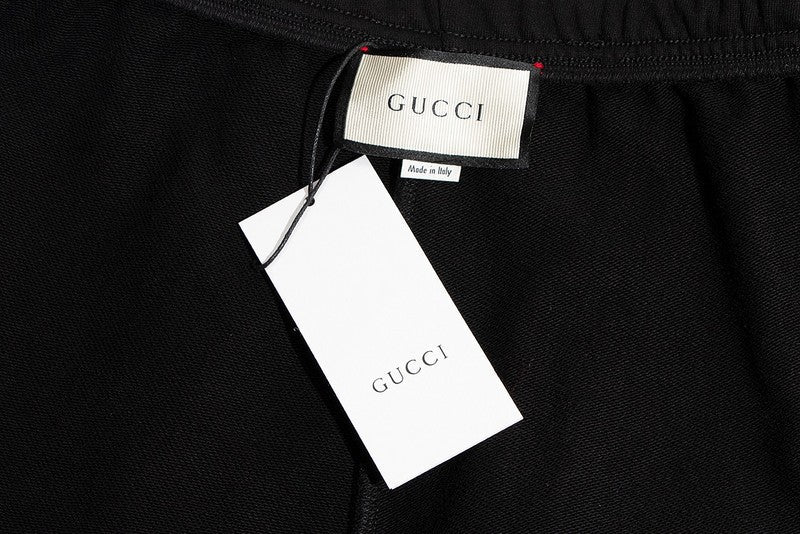 Side profile of Gucci luxury clothing with tailored silhouette