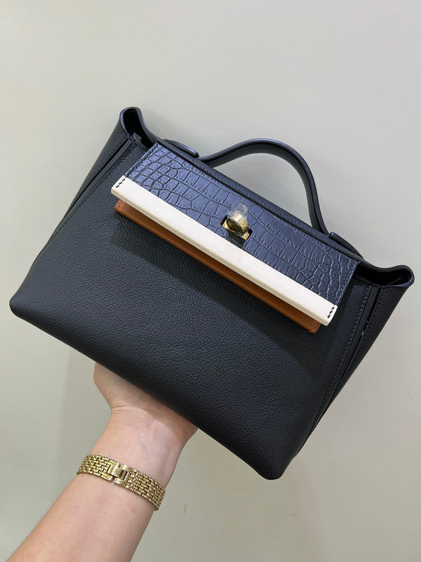 Side view of minimalist structured handbag