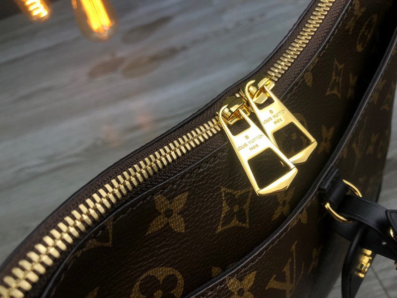 Top view of classic sleek women's handbag – women's statement bag