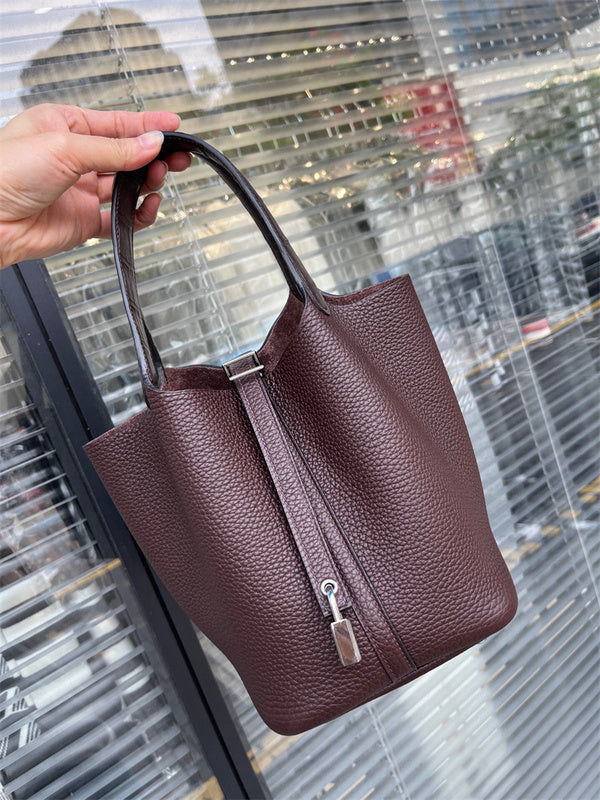 Side view of tailored structured handbag