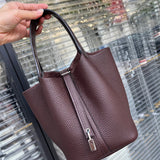 Side view of tailored structured handbag