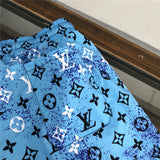 Close-up detail shot of Louis Vuitton cotton t-shirt with runway-inspired design