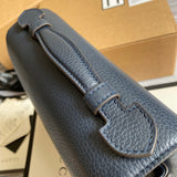 Top view of modern sleek women's handbag – women's designer-style accessory