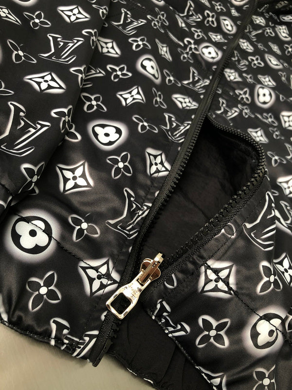 Flat lay presentation of Louis Vuitton luxury clothing with tailored silhouette