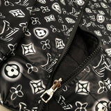 Flat lay presentation of Louis Vuitton luxury clothing with tailored silhouette