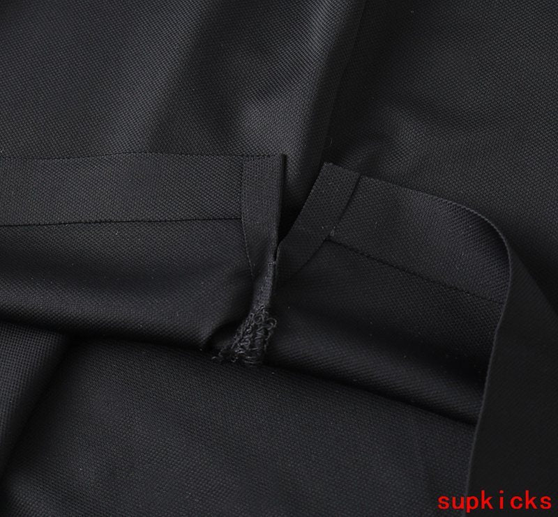 Close-up detail shot of Moncler luxury clothing with contemporary cut