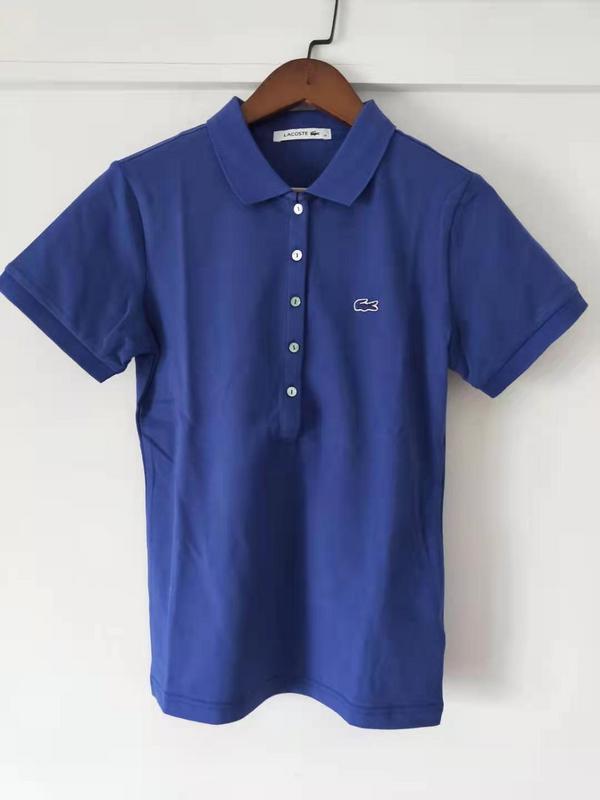 Side profile of Lacoste luxury clothing with tailored silhouette
