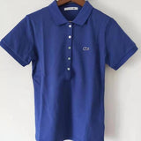 Side profile of Lacoste luxury clothing with tailored silhouette