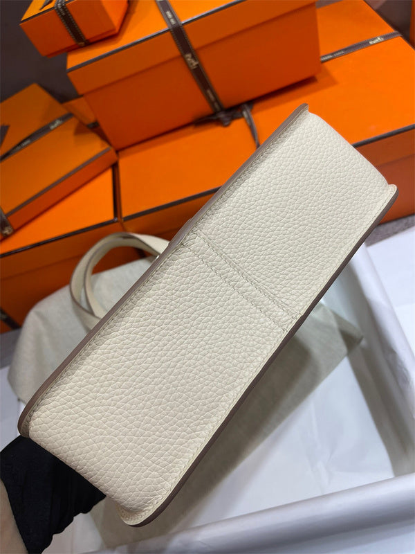 Side view of understated structured handbag