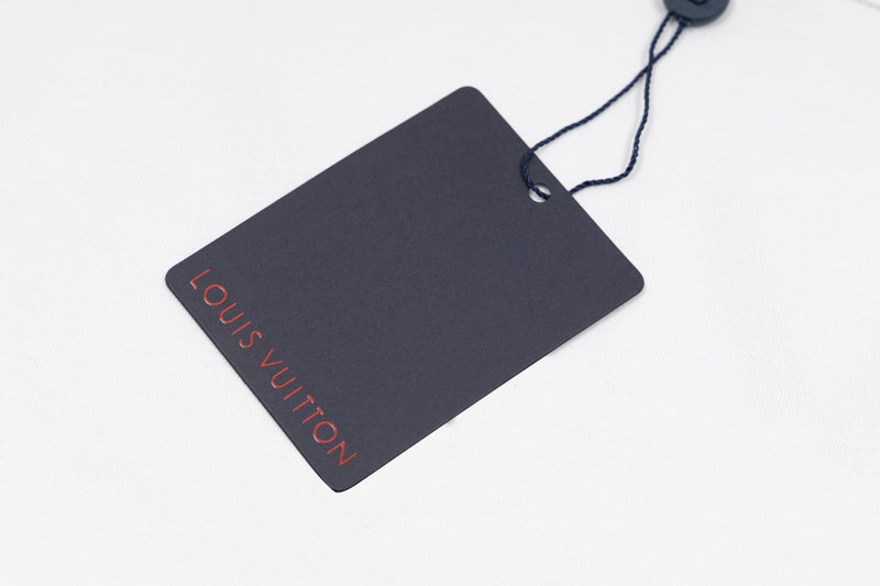 Flat lay presentation of Louis Vuitton cotton t-shirt with monogram-inspired silhouette