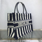 Close-up detail of modern statement women's handbag – women's luxury accessory