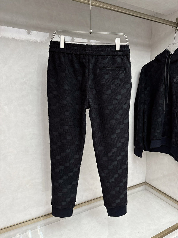 Close-up detail shot of Louis Vuitton luxury clothing with everyday silhouette
