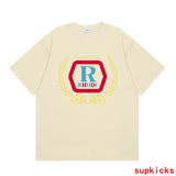 Close-up detail shot of Rhude luxury clothing with signature branding