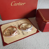 Angled view of Cartier unisex jewelry piece