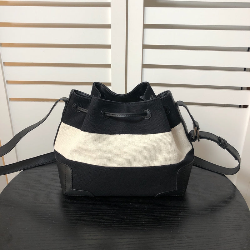 Front view of refined signature women's handbag – women's statement bag