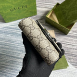 Handle and strap detail of modern signature women's handbag – women's statement bag