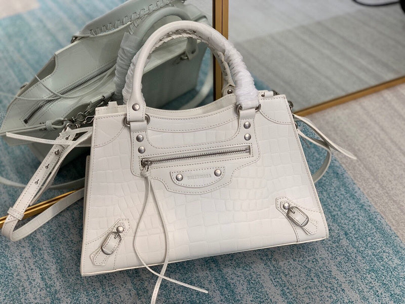 Sophisticated Faux Leather Handbag - Signature Hardware Accents | Women's Premium Handbag #664 - side angle view (image 2) of designer-inspired handbag
