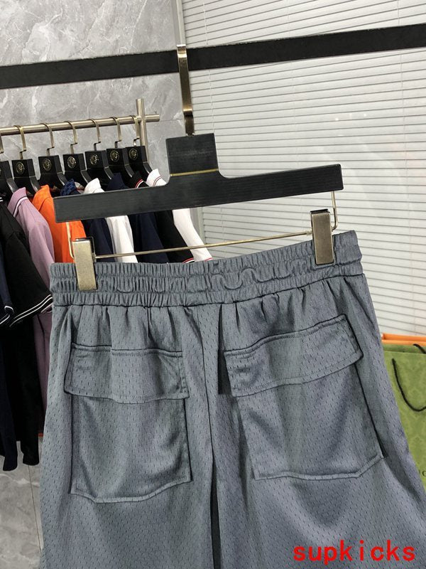Back view of Rhude luxury clothing with monogram-inspired silhouette