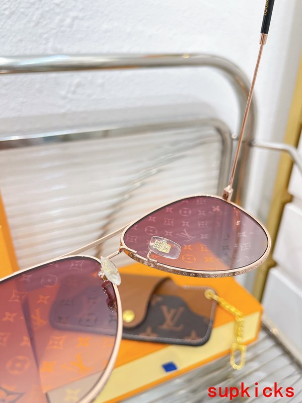 Close-up detail view of Louis Vuitton unisex sunglasses
