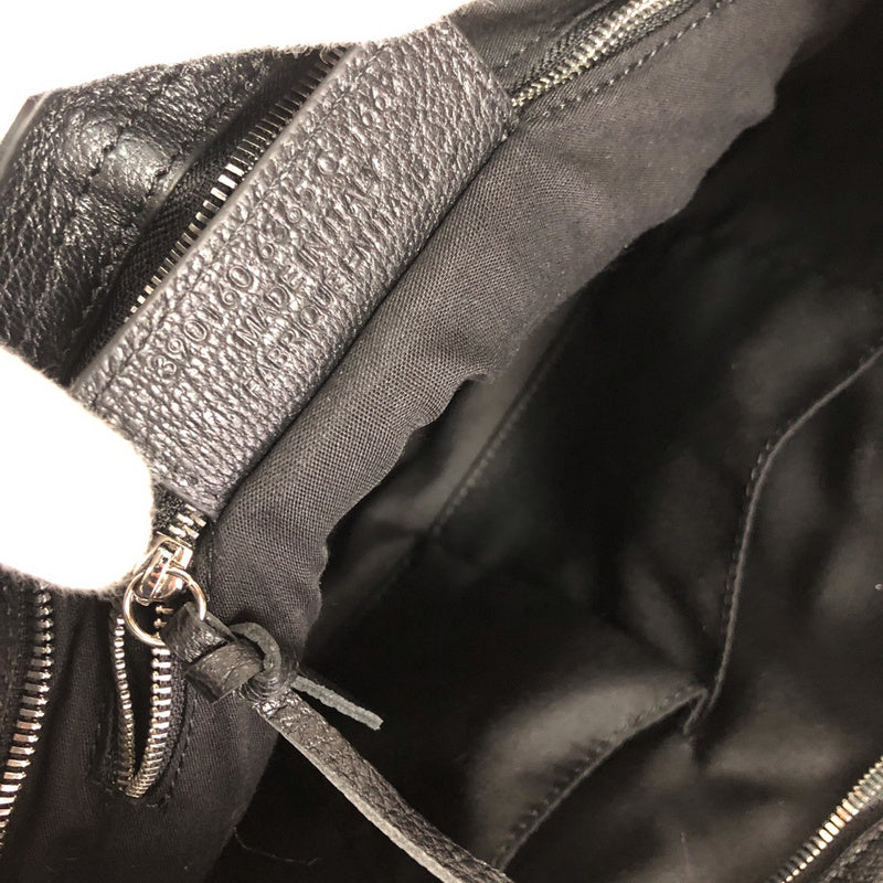 Side profile of modern refined women's handbag – women's luxury handbag