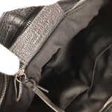Side profile of modern refined women's handbag – women's luxury handbag