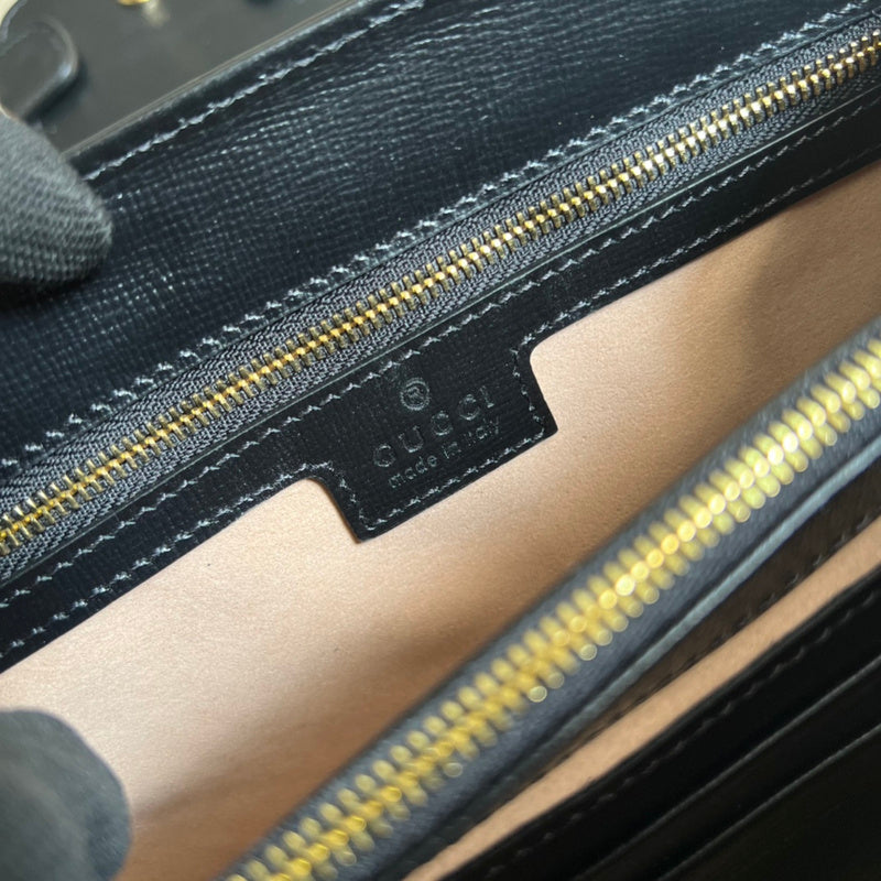 Side profile of polished refined women's handbag – women's designer-style accessory