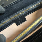 Side profile of polished refined women's handbag – women's designer-style accessory
