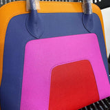 Side view of statement structured handbag
