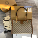 Front view of premium modern women's handbag – women's statement bag