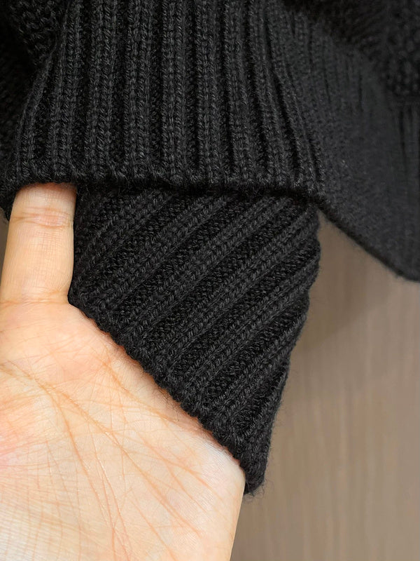 Close-up detail shot of Louis Vuitton luxury clothing with monogram-inspired silhouette