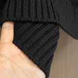 Close-up detail shot of Louis Vuitton luxury clothing with monogram-inspired silhouette