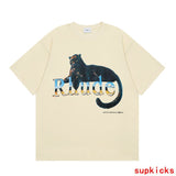 Side profile of Rhude luxury clothing with logo-detail design