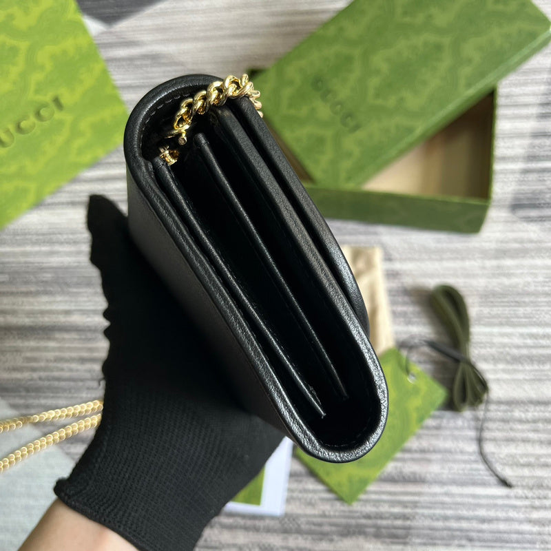 Front view of modern polished women's handbag – women's designer-style accessory