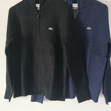 Front view of Lacoste luxury clothing with monogram-inspired silhouette