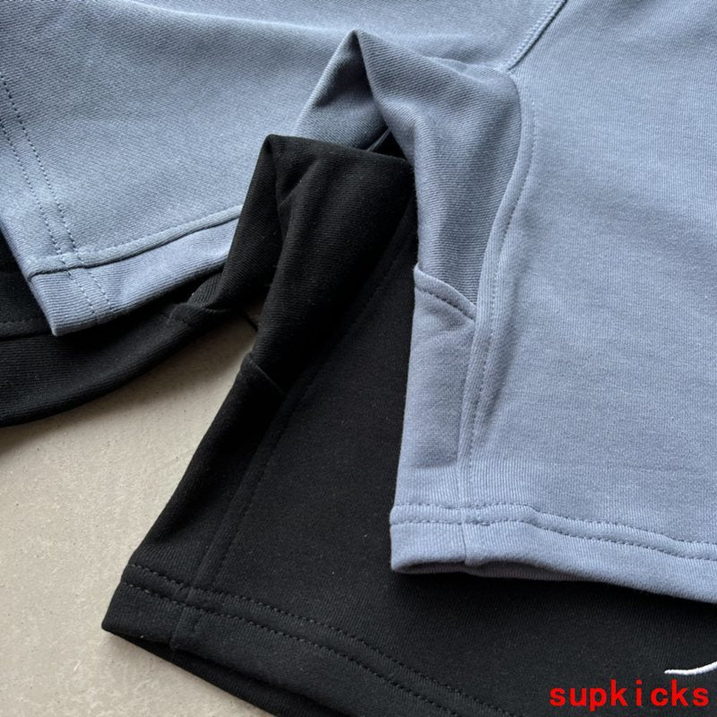 Front view of Rhude luxury clothing with everyday silhouette