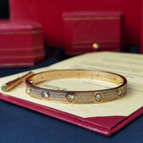 Side view of Cartier unisex jewelry piece