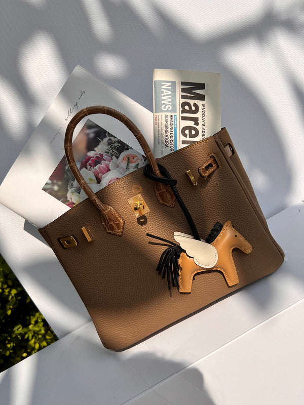 Statement handbag styled for everyday wear