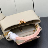  Tailored top-handle bag carried on shoulder 22