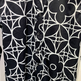 Full styled look of Louis Vuitton cotton t-shirt with signature branding
