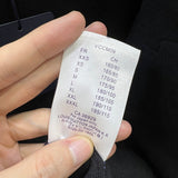 Close-up detail shot of Louis Vuitton luxury clothing with runway-inspired design