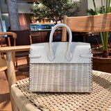 Side view of fluid structured handbag