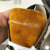 Alexander McQueen White Slip-On Sneakers - Close-Up Texture View