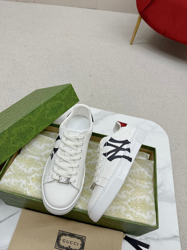 Side profile of Gucci crisp white sneakers cushioned comfort fit