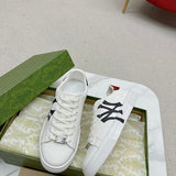 Side profile of Gucci crisp white sneakers cushioned comfort fit